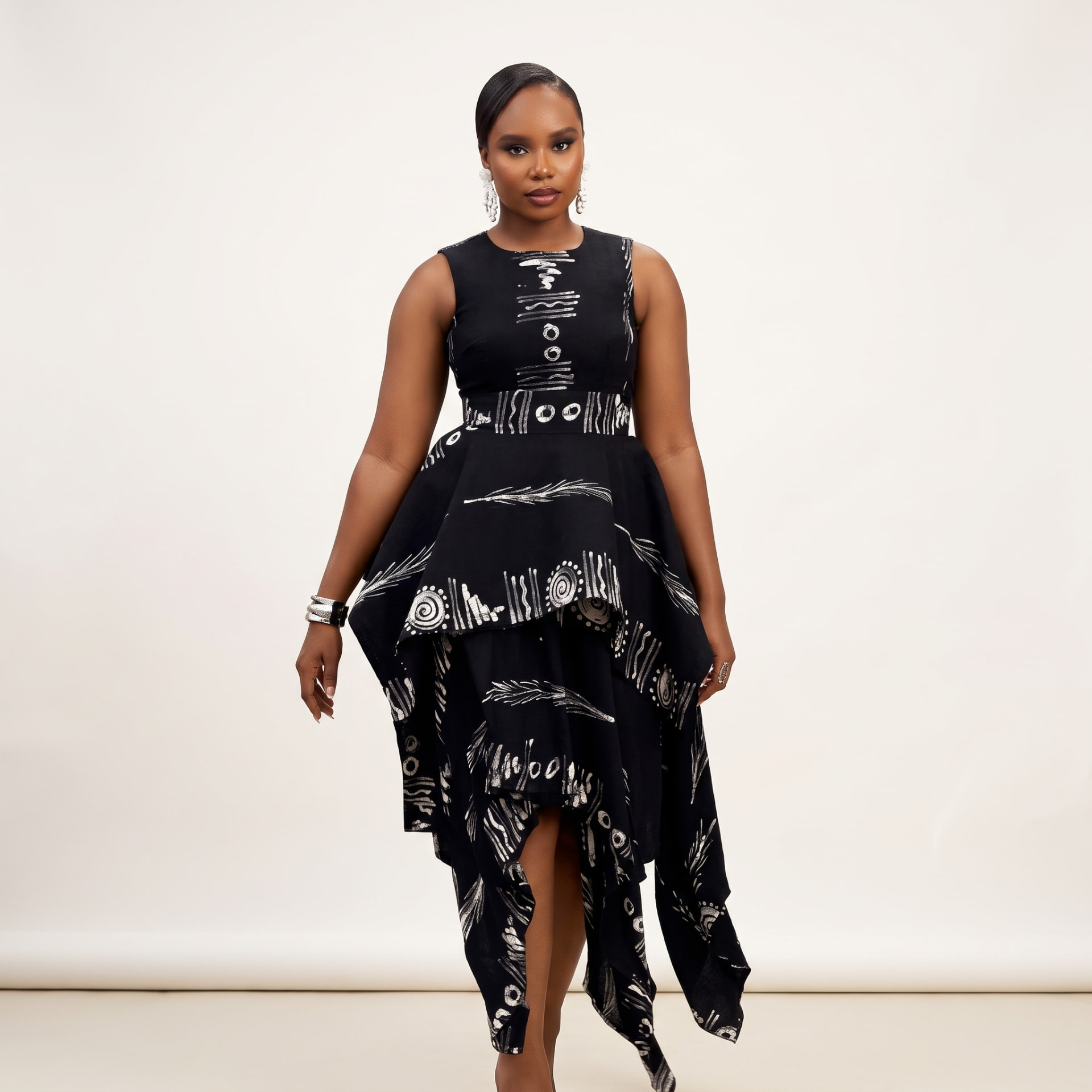The Kiki Asymmetric Tiered Peplum Dress